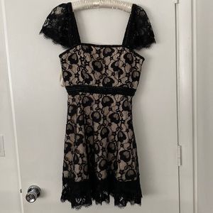 NWT BLACK LACE WITH NUDE UNDERNEATH detailed beading on shoulders and waist.